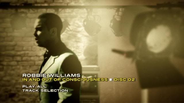 PDVD 007 34 - Robbie Williams - In And Out Of Consciousness: Greatest Hits 1990-2010(2010) [3 DVD9]