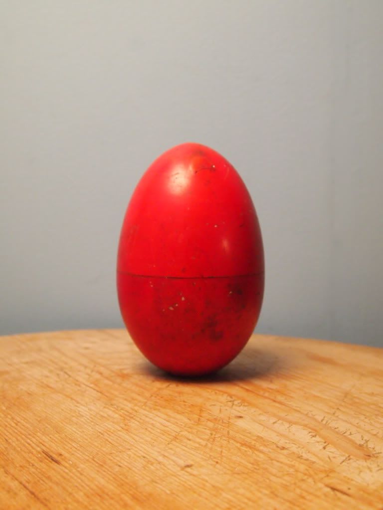 red wooden egg